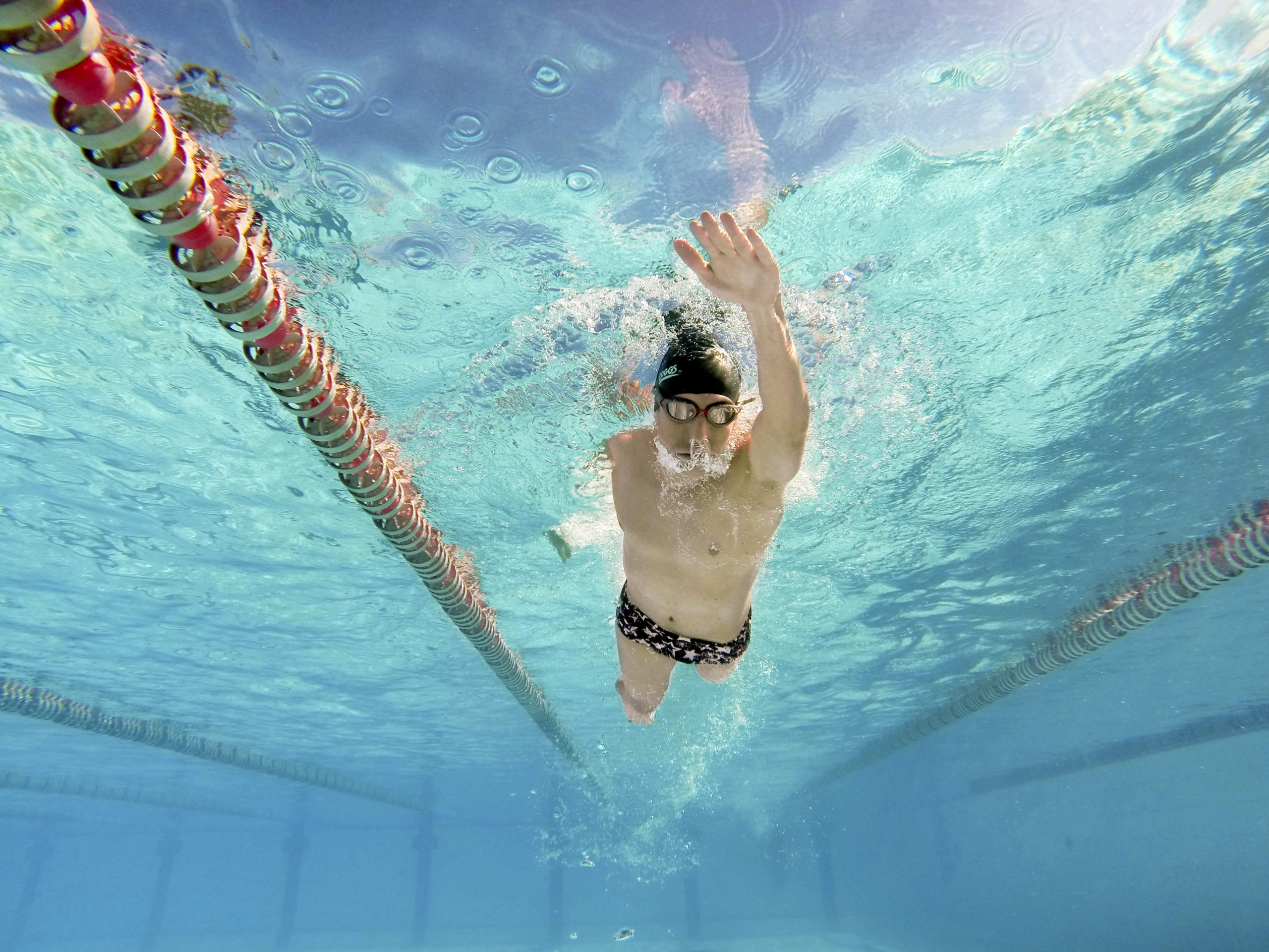 Schwimmer im Wasserbad